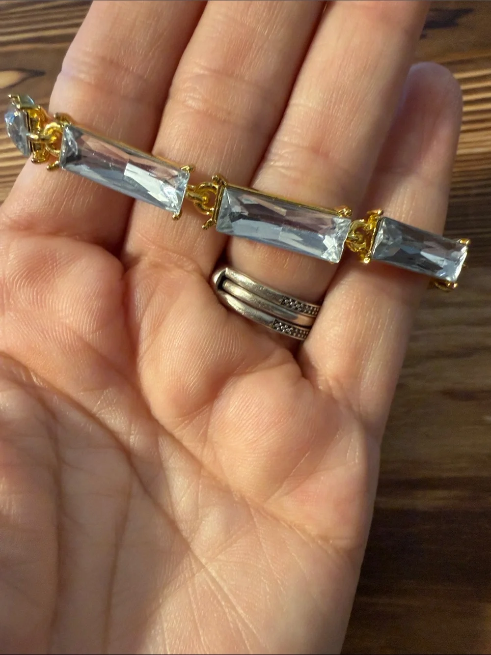 Gold tone with clear Tennis bracelet wiith baguette-cut stones